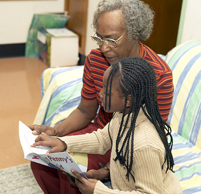 An Oasis tutor with her student