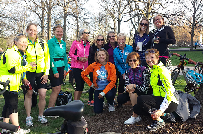 Marsha Clark, kneeling in the center, with some of the people in the Women’s Cycling Community.